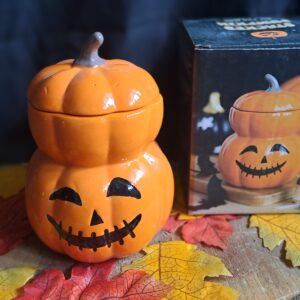 Waxbrander gestapelde pompoenen